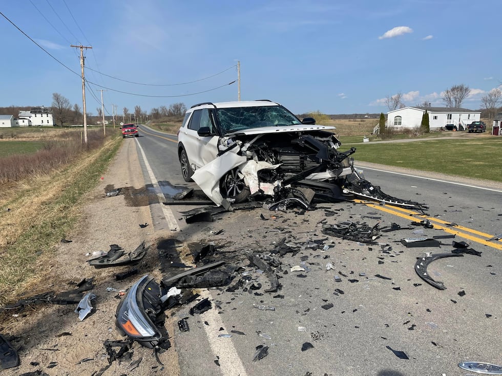 Three people rushed to hospital following two-vehicle crash